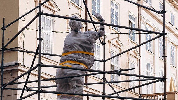  Statue wrapped in protective material.